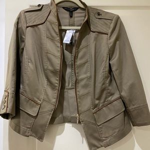 White House Black Market zippered khaki jacket.